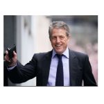 Hugh Grant settles claim against Sun publisher due to risk of £10m legal costs